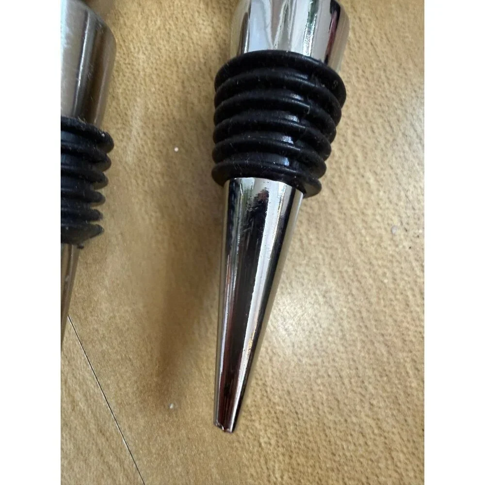 Two piece metal wine stoppers